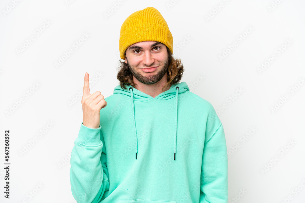 Young handsome man isolated on white chroma background pointing with the index finger a great idea