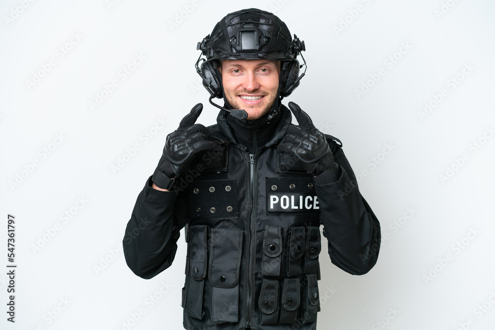 SWAT man over isolated white background smiling with a happy and pleasant expression SWAT man over isolated white background smiling with a happy and pleasant expression
