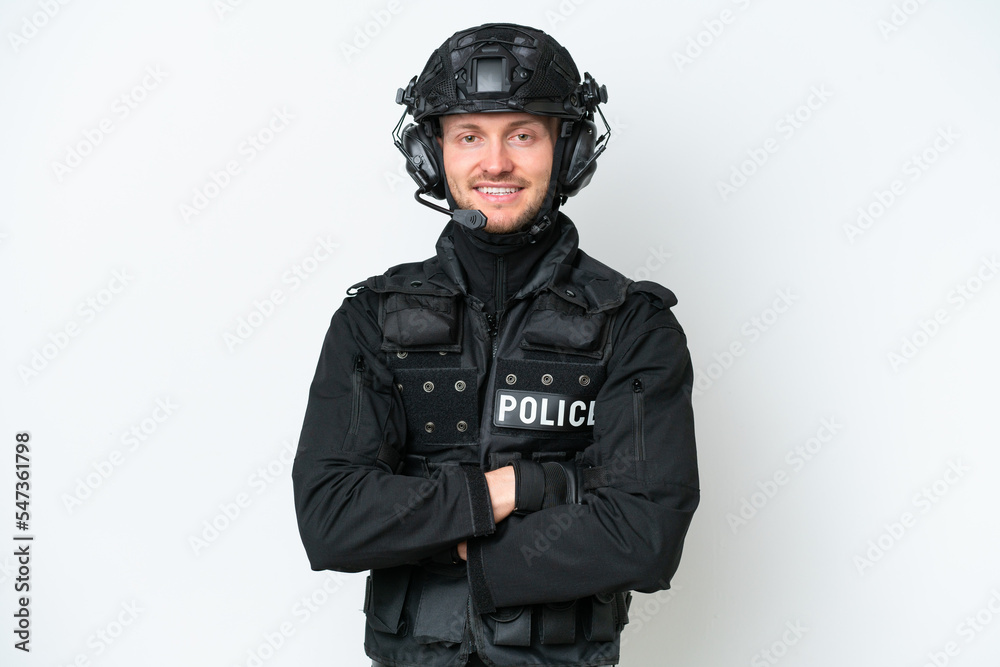 SWAT man over isolated white background with arms crossed and looking forward SWAT man over isolated white background with arms crossed and looking forward