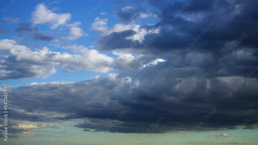 dramatic sky with dark blue rainy clouds background at sunset time lapse dramatic sky with dark blue rainy clouds background at sunset time lapse