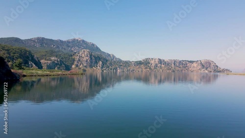 Beautiful seashore. Islands in the distance. Colorful blue sea. The beauty of Turkey. Beautiful rocks and mountains. Sunny clear day. Beautiful water.	