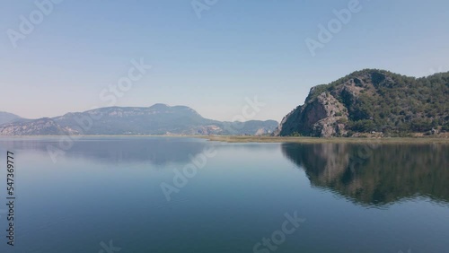 Beautiful seashore. Islands in the distance. Colorful blue sea. The beauty of Turkey. Beautiful rocks and mountains. Sunny clear day. Beautiful water.	