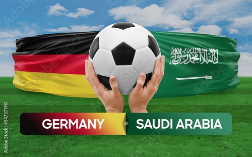 Germany vs Saudi Arabia national teams soccer football match competition concept. © prehistorik