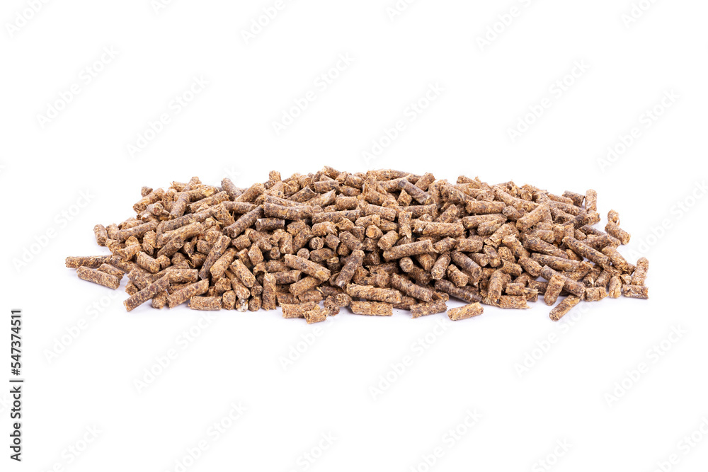 Animal feed. Sunflower granulated feed on white background, close-up. Animal cattle food pellets. Heap of animal feed pellets on white background. Animal feed. Sunflower granulated feed on white background, close-up. Animal cattle food pellets. Heap of animal feed pellets on white background.