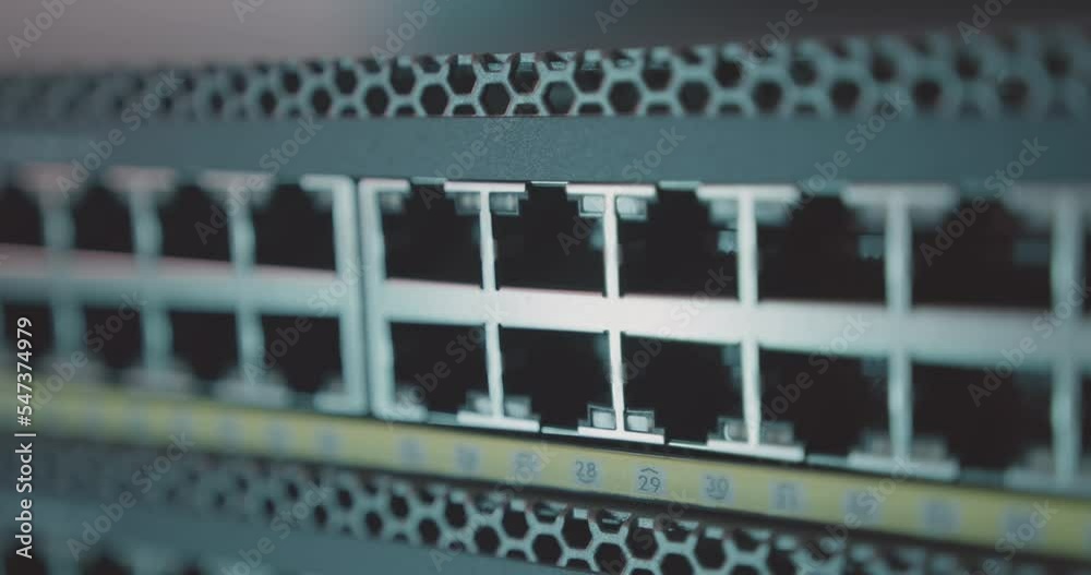 Extreme close-up macro of individual inputs and outputs of server switch Extreme close-up macro of individual inputs and outputs of server switch