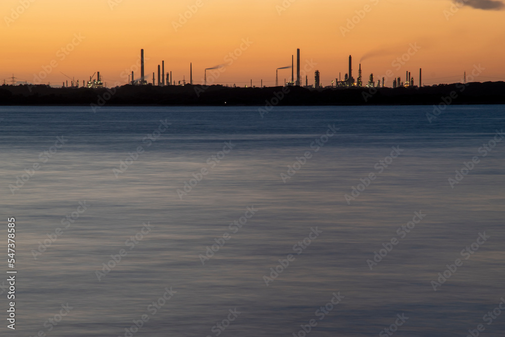 Sunset over the solent with calm summer seas and still waters Sunset over the solent with calm summer seas and still waters