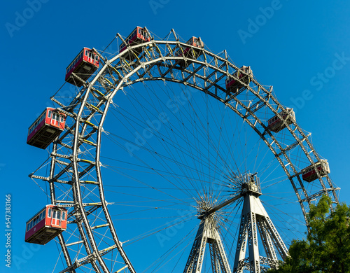 the Giant Ferris Wheel in the Prater city park in downtown Vienna under a blue sky