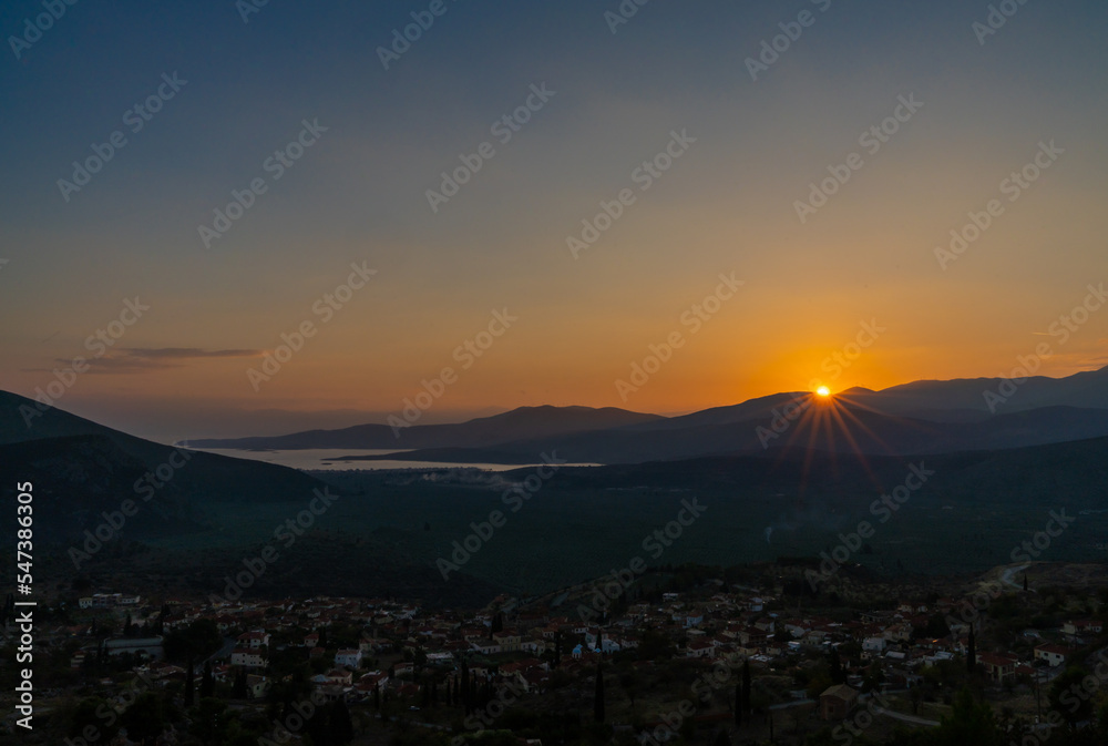 sunset view of the village of Chrisso and the Crissaean Gulf in Central Greece