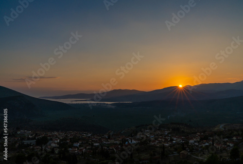 sunset view of the village of Chrisso and the Crissaean Gulf in Central Greece