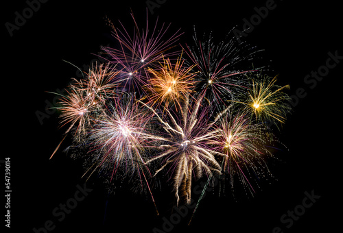 Colored fireworks on black background copy space