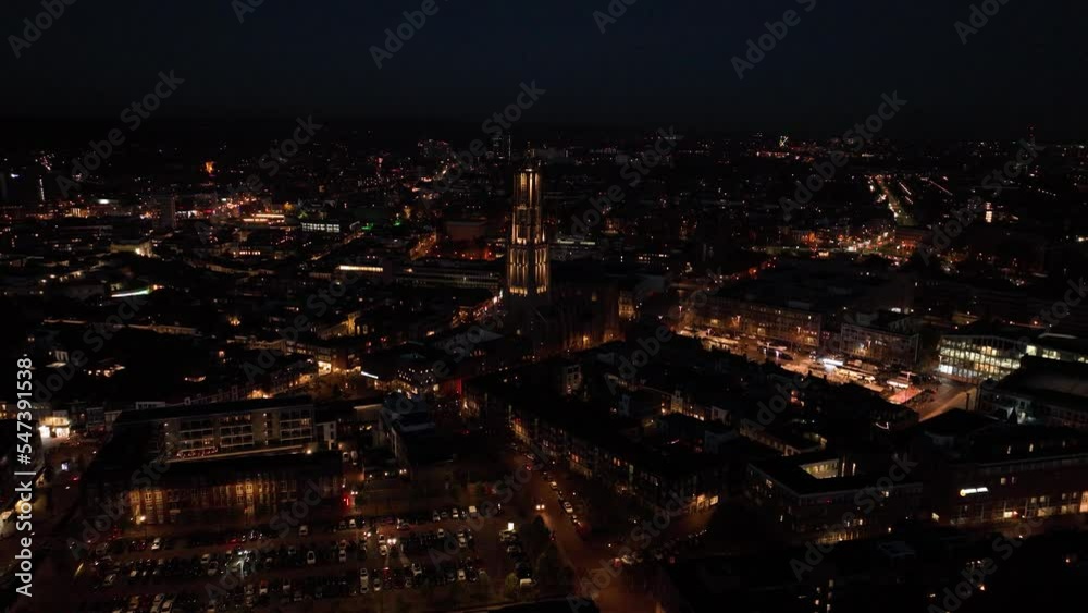 Arnhem city in the Netherlands by night Aerial drone. City center, rhine river and church, Eusebiuskerk, john frost bridge, skyline and infrastructure, city center. Arnhem city in the Netherlands by night Aerial drone. City center, rhine river and church, Eusebiuskerk, john frost bridge, skyline and infrastructure, city center.