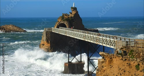 Swell breaking on the famous rock of the Virgin in the city of Biarritz (in slow motion)