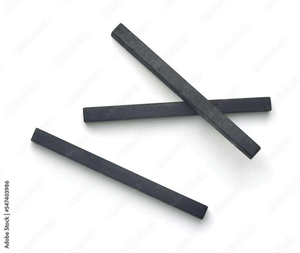 Top view of compressed charcoal drawing sticks Top view of compressed charcoal drawing sticks