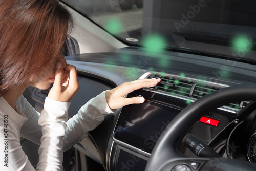 Wallpaper Mural Women cover their noses from foul odors. Bad smell from the vent on the instrument panel when the air conditioner is on. concept of vehicle inspection Torontodigital.ca