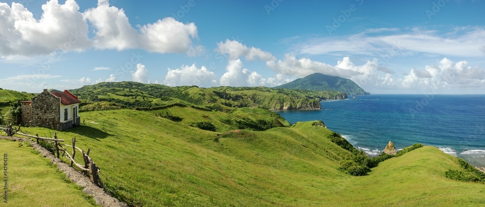Naklejka premium Panoramic view of Hills over-looking sea in Batanes, Philippine