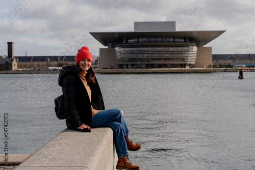 Photography Travel. A woman walks around the city of Copenhagen. Denmark.