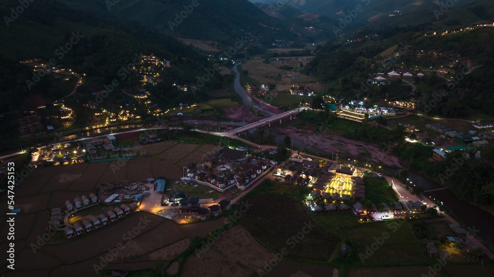 twilight landscape and over lighting in Sapan Village in the valley, famous tourist attraction of Nan Province in the northern of Thailand