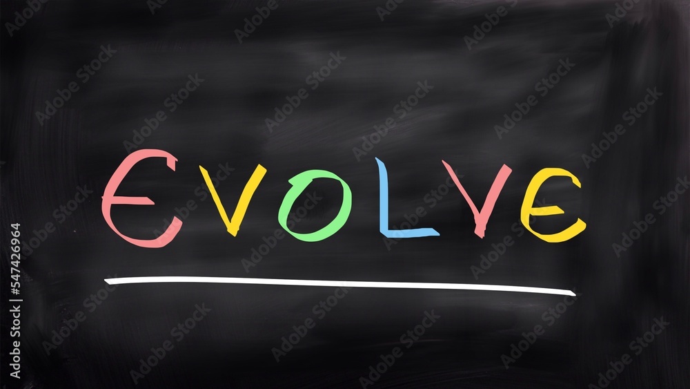 Evolve handwritten concept on blackboard Evolve handwritten concept on blackboard