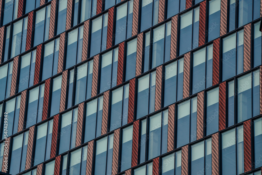 Windows of modern office building in the city pattern Windows of modern office building in the city pattern