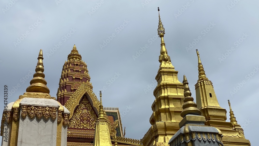 Fototapeta premium Ornate Buddhist golden towers and stupas, Cambodia
