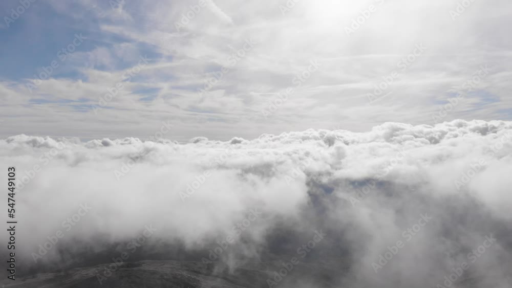 Olympus. Stunning cinematic aerial shot of a drone in 4k flying close to the clouds. Clouds floating in the sky, cloud detail videos. cloud backgrounds and videos of clouds. Olympus. Stunning cinematic aerial shot of a drone in 4k flying close to the clouds. Clouds floating in the sky, cloud detail videos. cloud backgrounds and videos of clouds.