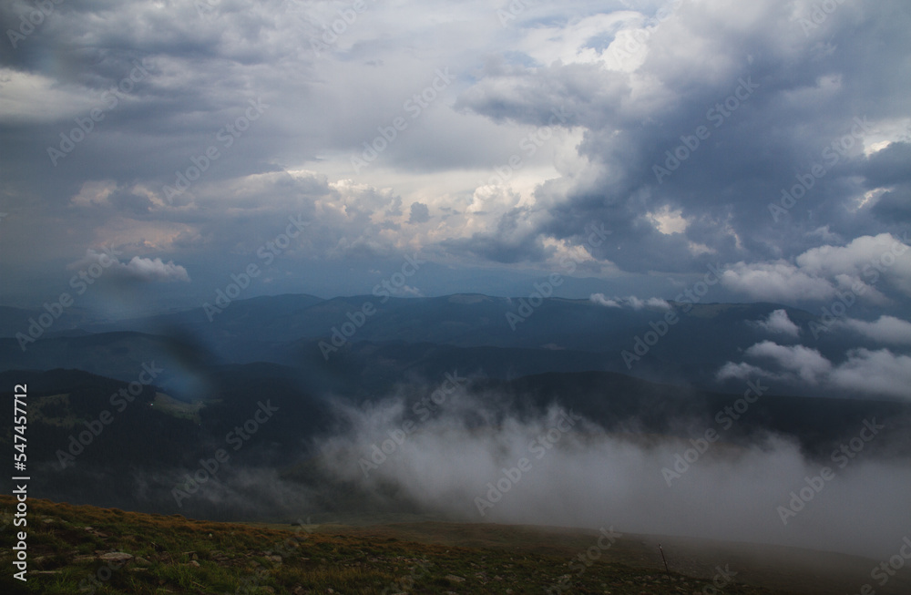 Beautifull over clouds view of Chornohora highest mountain range in Western Ukraine after the storm.