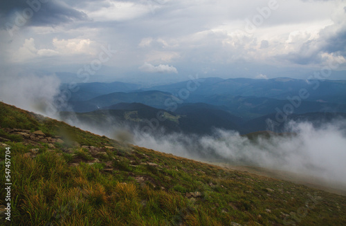 Beautifull over clouds view of Chornohora highest mountain range in Western Ukraine after the storm. © versh