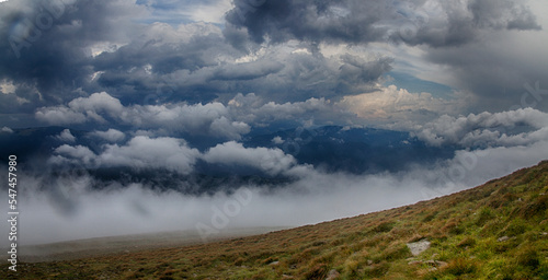 Beautifull over clouds view of Chornohora highest mountain range in Western Ukraine after the storm.