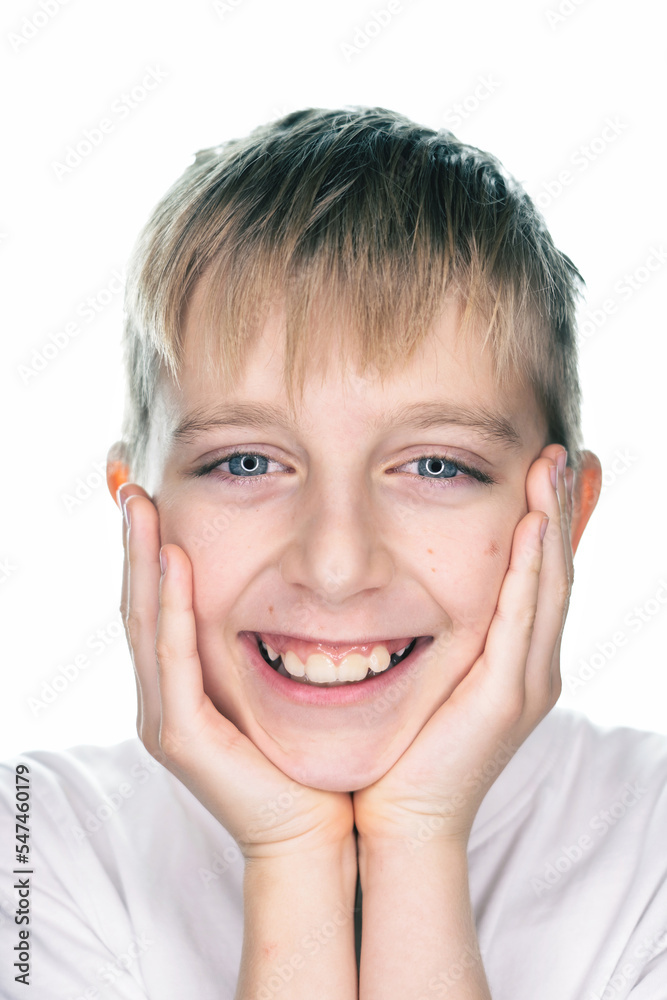 portrait of a boy, an expression of pure joy, happiness, happy face on white background portrait of a boy, an expression of pure joy, happiness, happy face on white background
