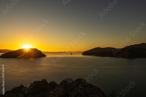 A tranquil sunrise over a calm ocean on the Bahía Concepción, Sea of Cortez, Baja de California Sur, Mexico