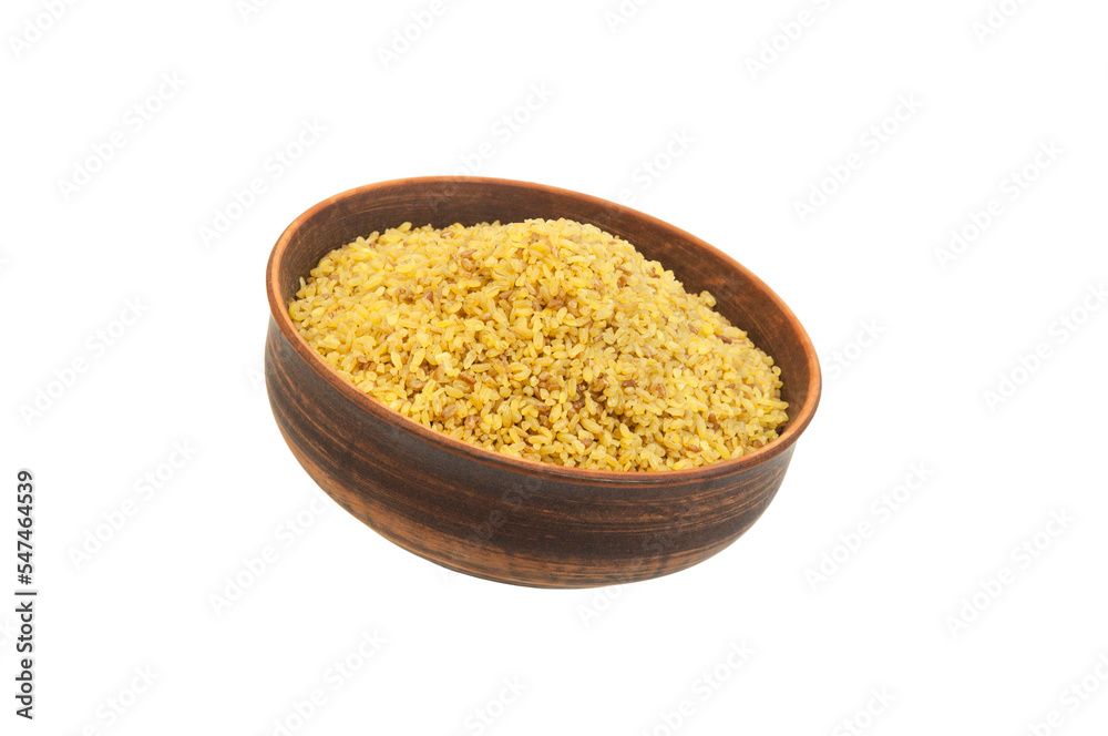 bulgur in a clay bowl on a white background. the concept of a good harvest of bulgur bulgur in a clay bowl on a white background. the concept of a good harvest of bulgur