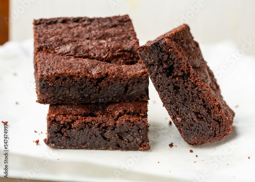 Chocolate prune Brownies on white background