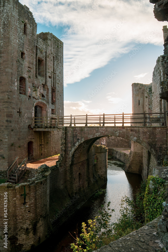 Old Medieval castle in UK. Medieval fortress. The ruins of raglan castle in Monmouthshire wales. Raglan Castle – Wales, United Kingdom. 