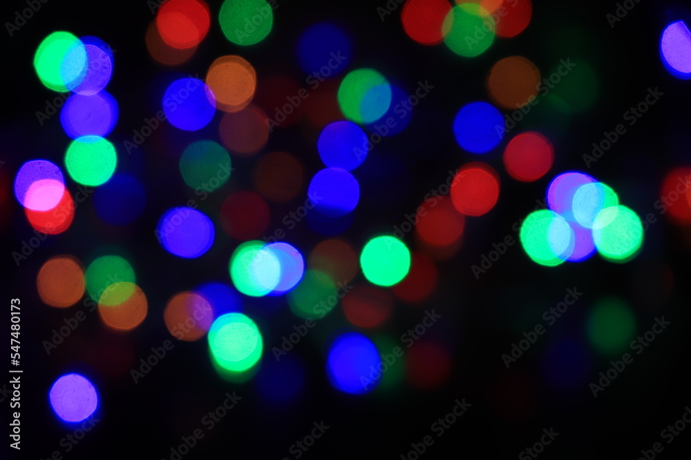 Artistic style - bokeh of lights in the background with blurring lights for your design, vintage or retro color tone