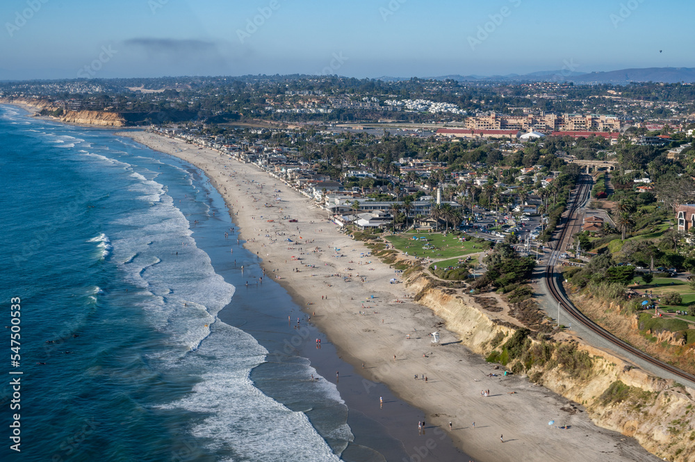 Aerial view Powerhouse park, train tracks, and coastline in San Diego California along the Del Mar bluffs