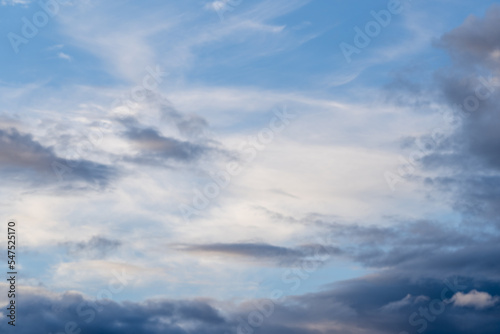 Fototapeta Naklejka Na Ścianę i Meble -  A beautiful blue autumn sky with white fluffy clouds makes for a fabulous overall view of the sky