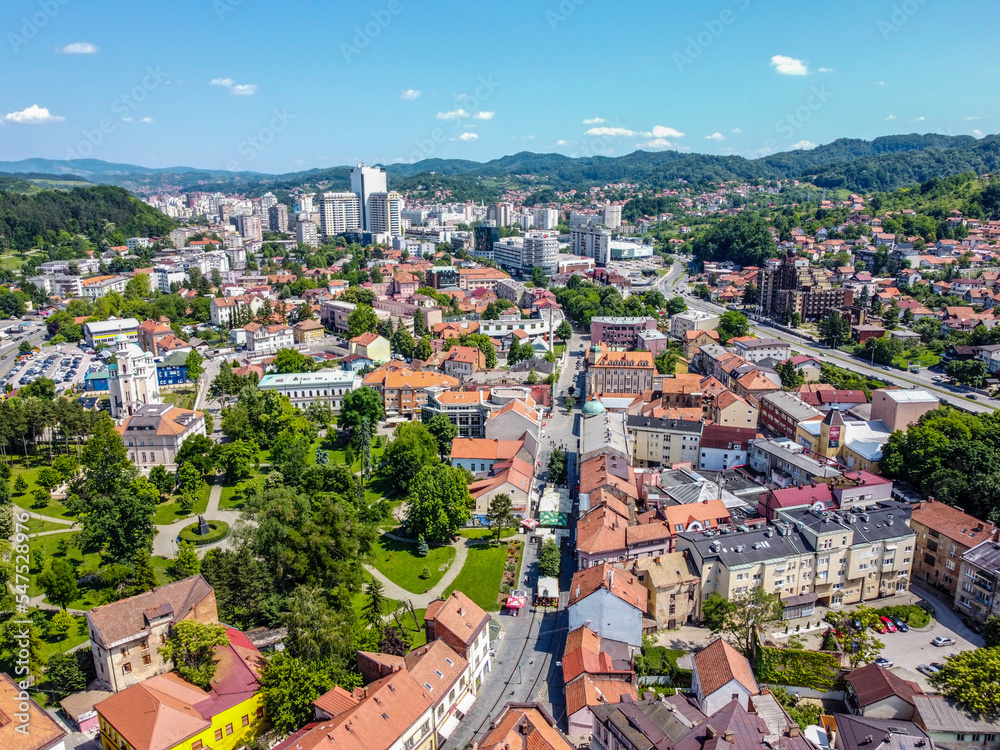 Aerial drone view of city of Tuzla, Bosnia and Herzegovina. Buildings, streets and residential houses. Tuzla is a town and municipality in north BiH, Europe.