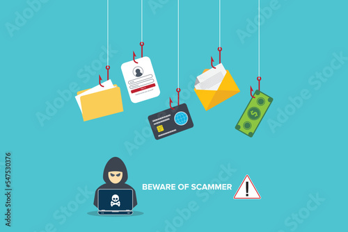 Beware of scammer. Hacker with laptop computer stealing confidential data, personal information and credit card detail. Hacking concept.