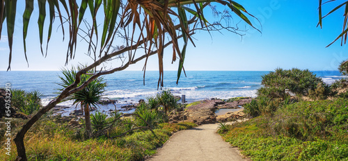 Coastal scenic view from the pathway leading down to the beach at Point Arkwright, Coolum, Sunshine Coast, Queensland, a very popular tourist or holiday destination. photo
