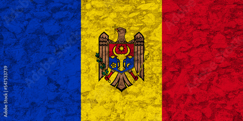 Flag and coat of arms of Moldova on a textured background. Concept collage.