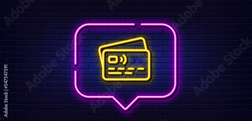 Neon light speech bubble. Credit card line icon. Bank money payment sign. Non-cash pay symbol. Neon light background. Card glow line. Brick wall banner. Vector