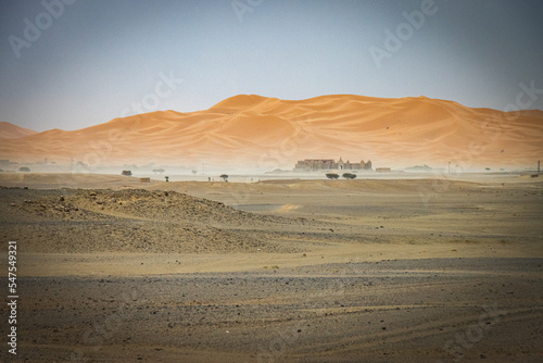sand dunes of erg chebbi during sandstorm, merzouga, morocco, north africa, sahara