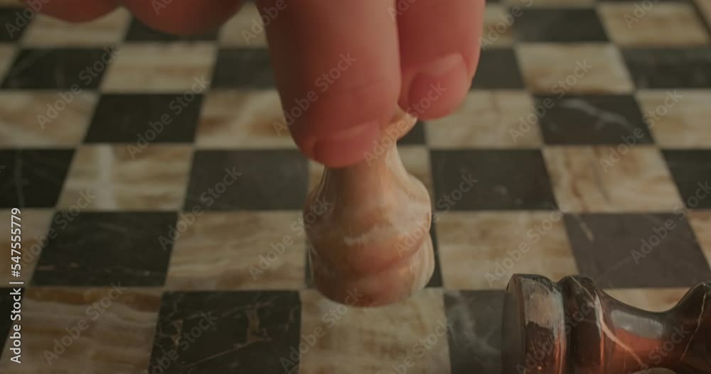 Checkmate. White check mates Black. 4K slow motion. Good and evil. White and black.