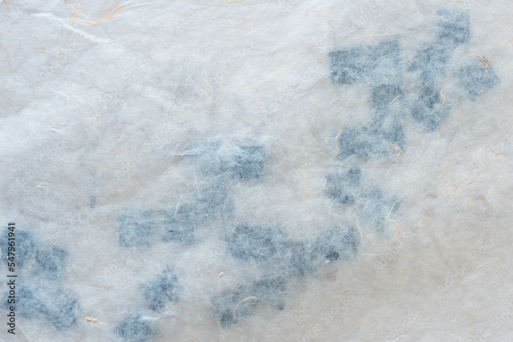 Fototapeta premium paper on black wooden tiles