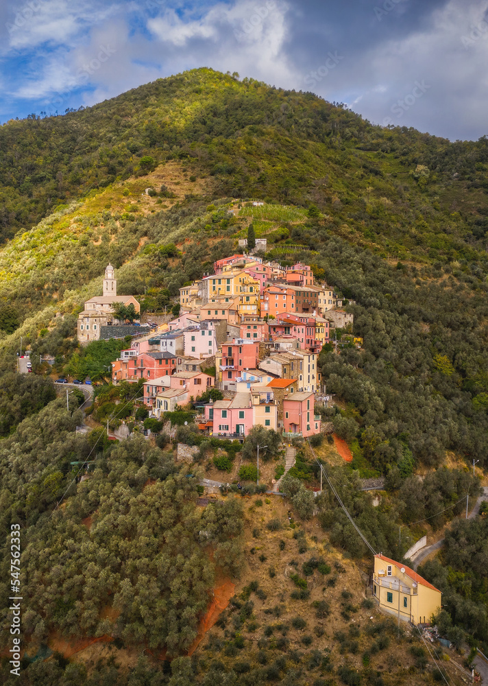 A small village lavaggiorosso high up in the mountains near Levanto on the Ligurian coast. Secluded and almost forgotten it looks at us. Aerial drone picture. September 2021