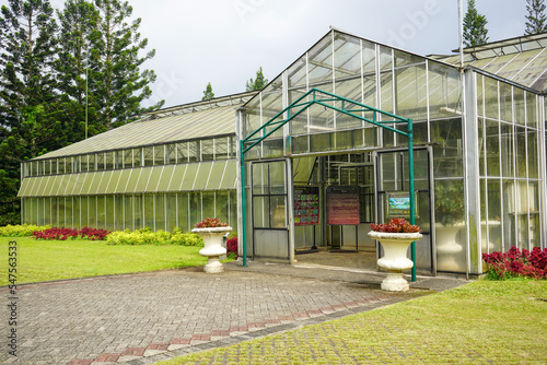 The function of the greenhouse is to 'catch' sunlight while protecting plants from cold or hot temperature.