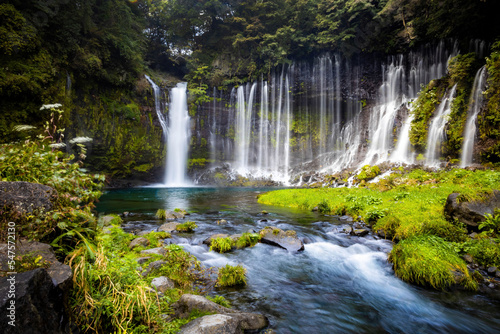 Scenic view of shira-ito waterfalls on summer day in Japan