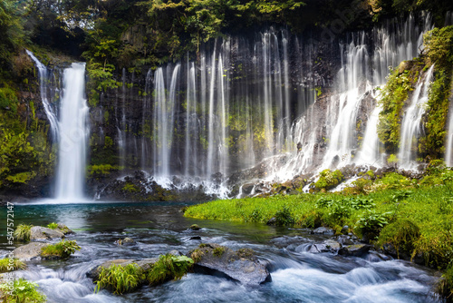 Scenic view of shira-ito waterfalls on summer day in Japan