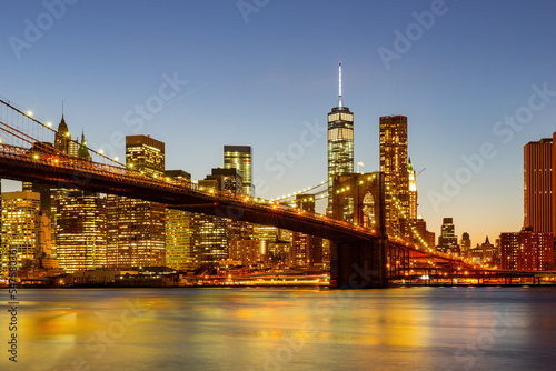 Sunset of the Brooklyn Bridge and New York City skyline
