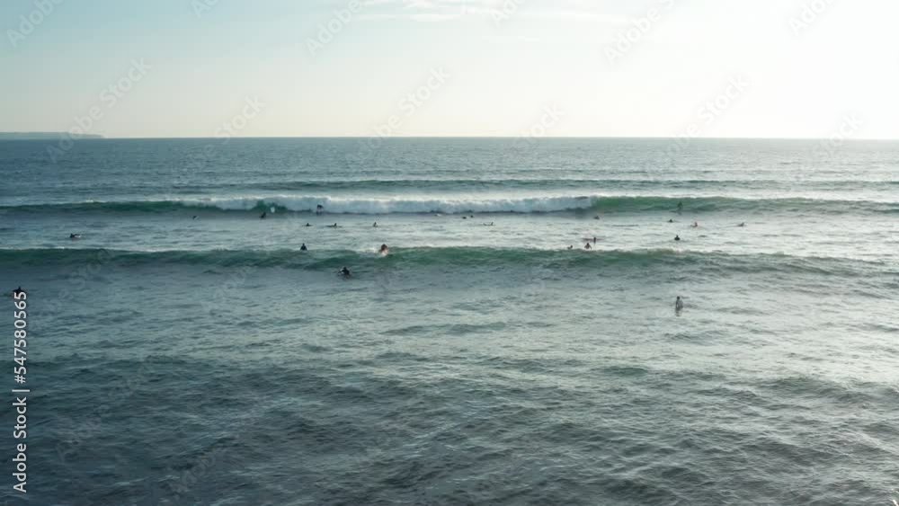 Aerial view of people swimming in the ocean, Asia Aerial view of people swimming in the ocean, Asia